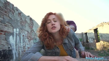 A red-haired waitress has sex with a government agent outdoors.